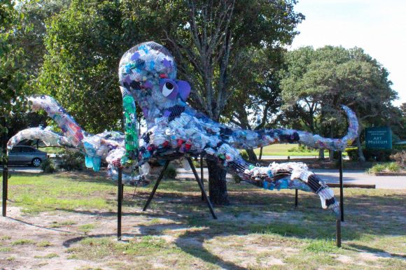 An octopus art piece in front of the art museum.