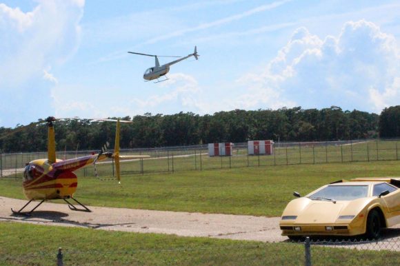 Two helicopters and a Lamborghini.